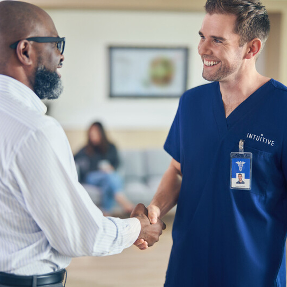 Sales employees shaking hands - Our Mission